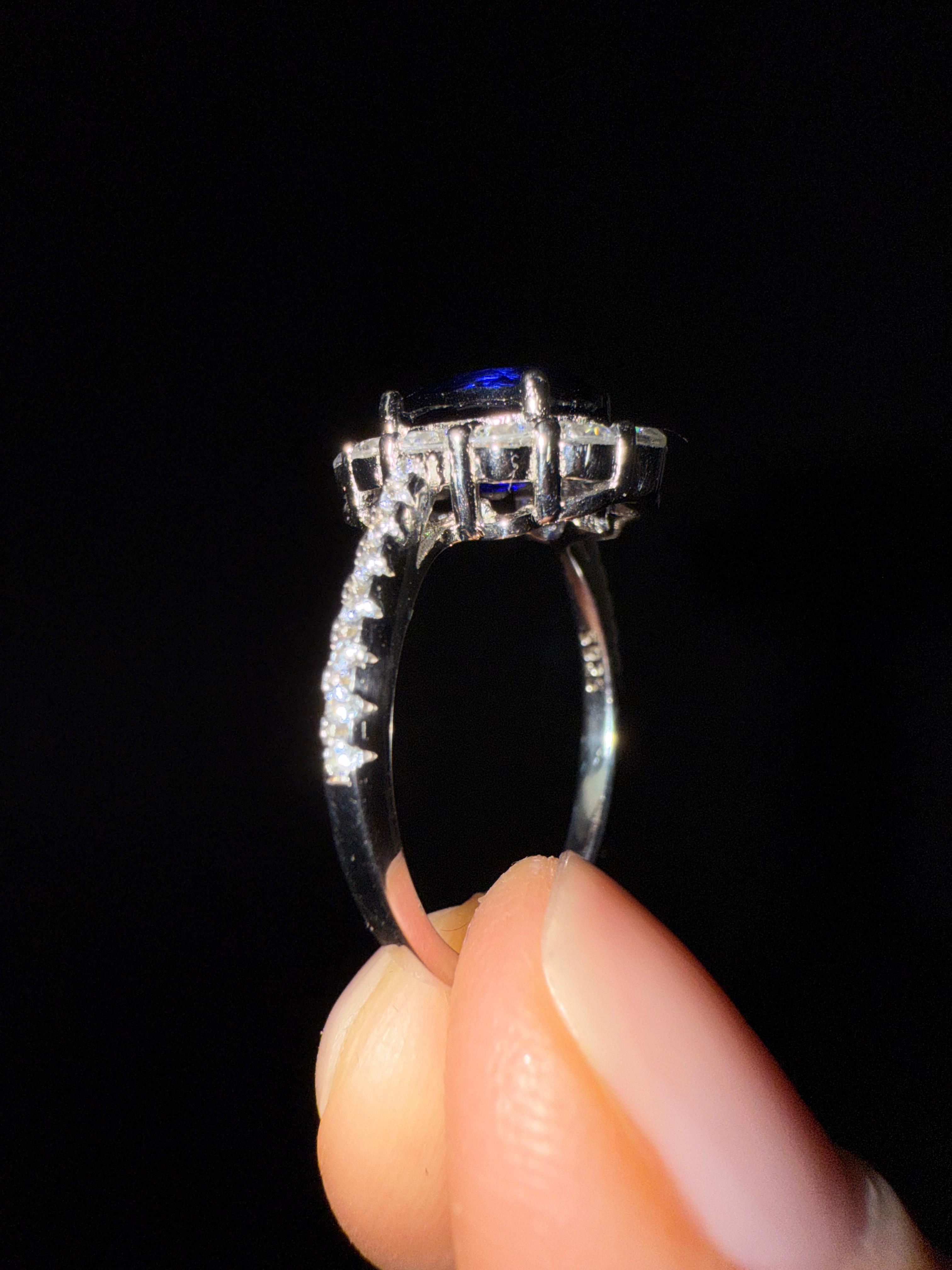 ROYAL OVAL SAPPHIRE HALO RING